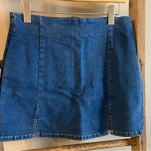 Denim skort for a picnic or a night on the town with boots